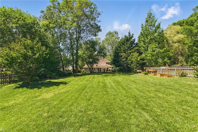 view of yard with fence