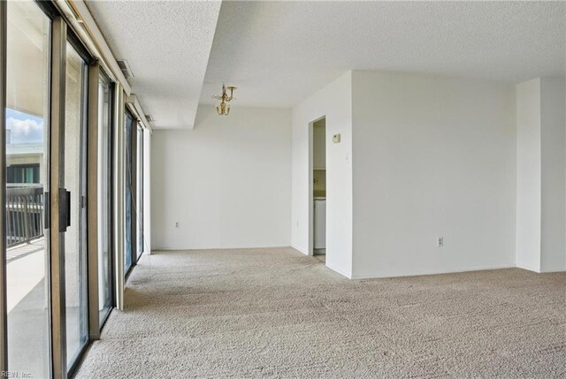 2830 Shore Dr Unit 900, Virginia Beach, VA 23451 - unfurnished room with a textured ceiling and light colored carpet