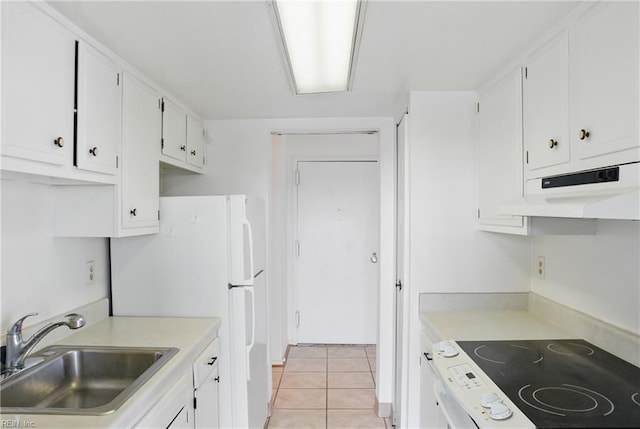 2830 Shore Dr Unit 900, Virginia Beach, VA 23451 - kitchen with white cabinets, electric range, a sink, light tile patterned floors, and under cabinet range hood