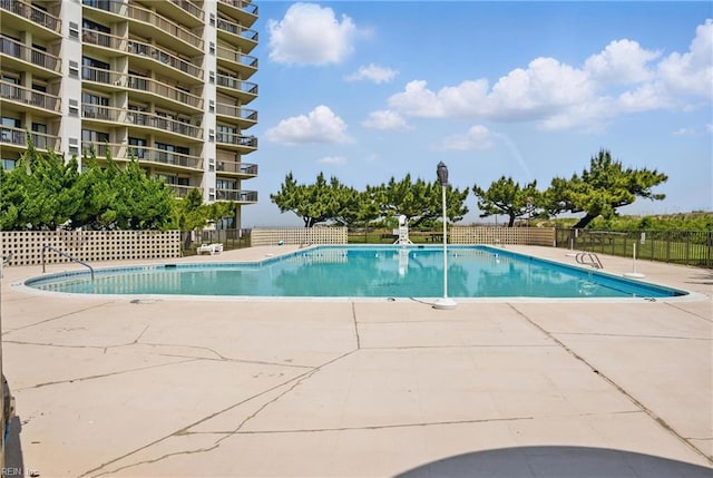 2830 Shore Dr Unit 900, Virginia Beach, VA 23451 - pool with a patio area and fence