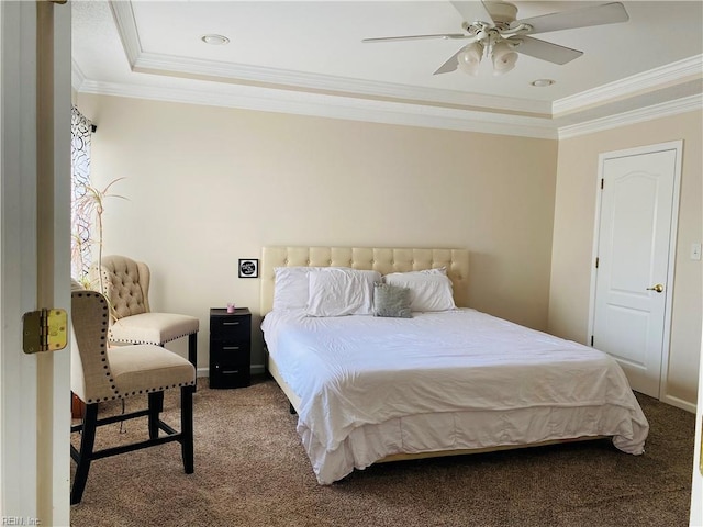 bedroom featuring crown molding, carpet floors, a ceiling fan, and a raised ceiling