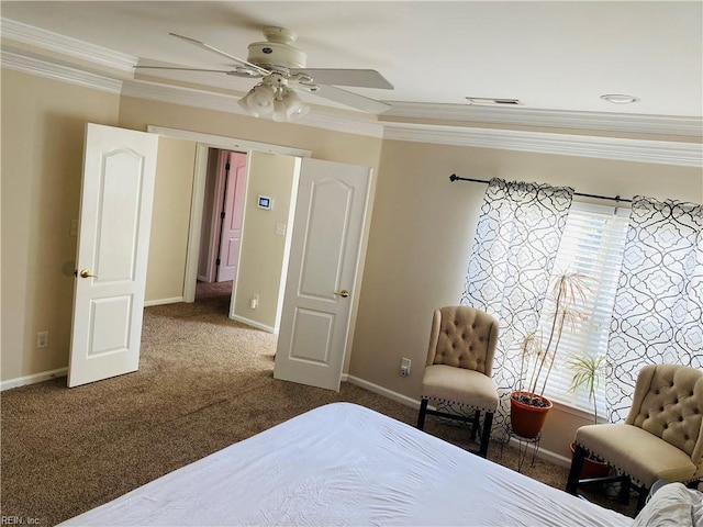 carpeted bedroom with baseboards, ornamental molding, ceiling fan, and visible vents