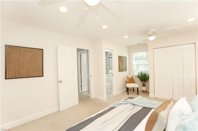 bedroom with light colored carpet, recessed lighting, and baseboards