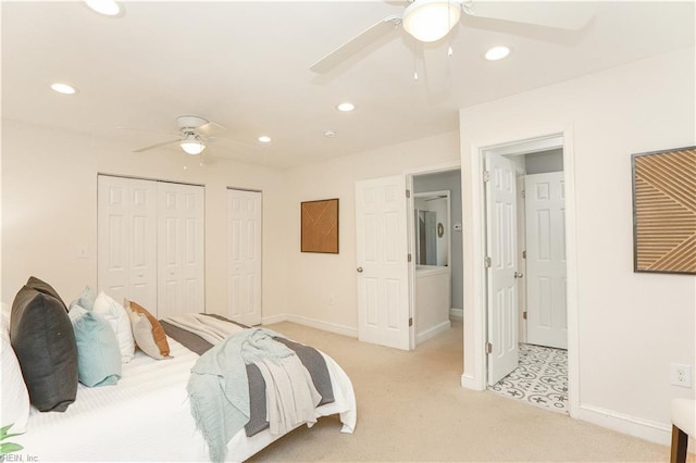 bedroom with recessed lighting, baseboards, and light carpet