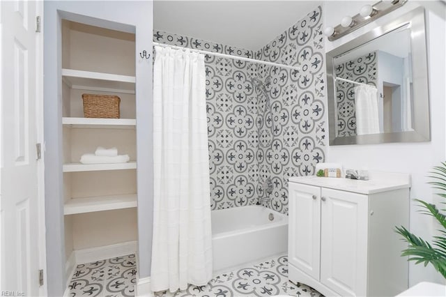 bathroom with vanity, tile patterned flooring, and shower / tub combo with curtain
