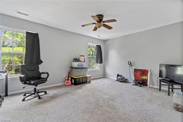 rec room with carpet flooring, baseboards, visible vents, and ceiling fan
