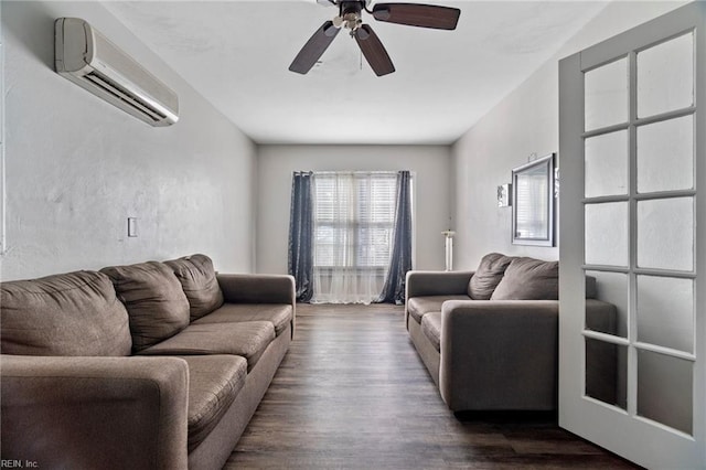 living area with ceiling fan, a wall mounted AC, and dark wood-style floors