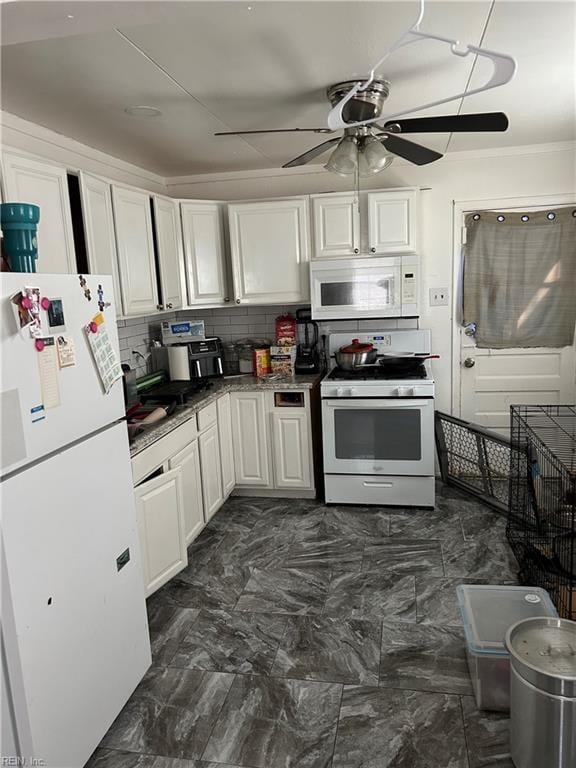 kitchen featuring white cabinets, white appliances, marble finish floor, a ceiling fan, and tasteful backsplash