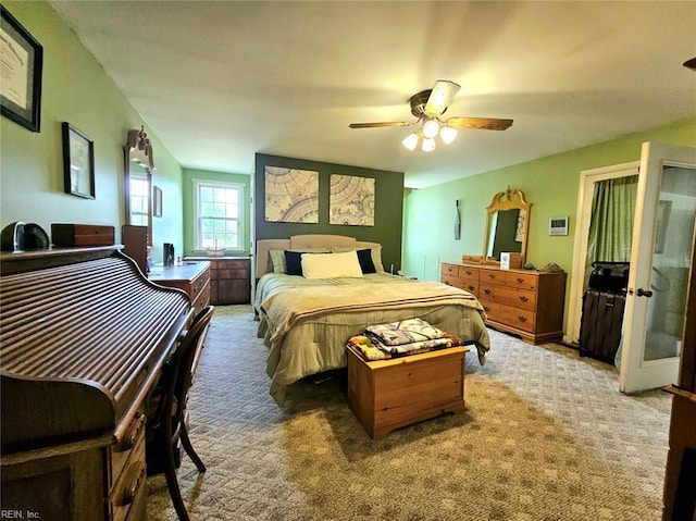 bedroom featuring carpet floors and ceiling fan
