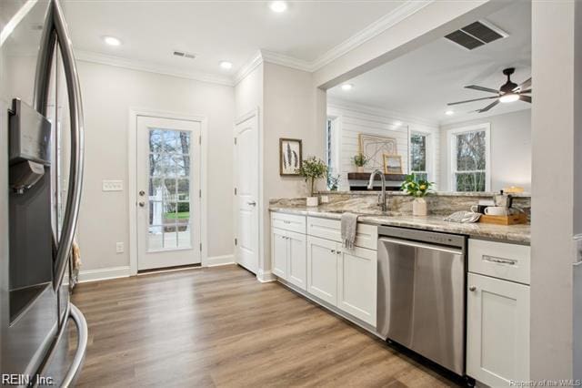 3009 Ridge Dr, Toano, VA 23168 - kitchen featuring recessed lighting, appliances with stainless steel finishes, plenty of natural light, and visible vents