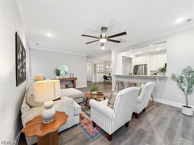 3009 Ridge Dr, Toano, VA 23168 - living room featuring a ceiling fan, baseboards, ornamental molding, and wood finished floors