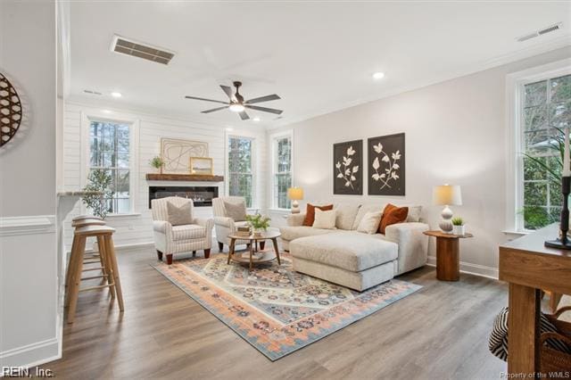3009 Ridge Dr, Toano, VA 23168 - living area featuring visible vents, plenty of natural light, and wood finished floors