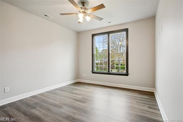 3009 Ridge Dr, Toano, VA 23168 - empty room featuring baseboards, a ceiling fan, dark wood-style floors, and visible vents