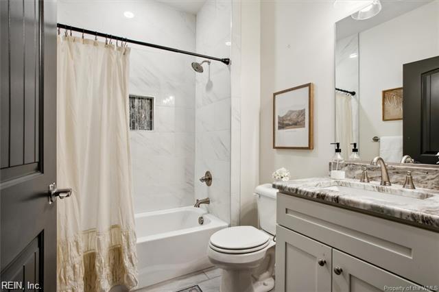 3009 Ridge Dr, Toano, VA 23168 - bathroom with toilet, shower / bath combo with shower curtain, and vanity