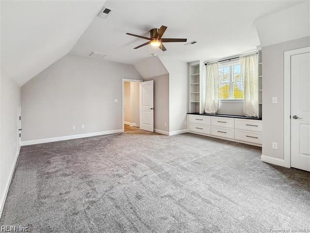3009 Ridge Dr, Toano, VA 23168 - unfurnished bedroom featuring baseboards, carpet, lofted ceiling, and visible vents