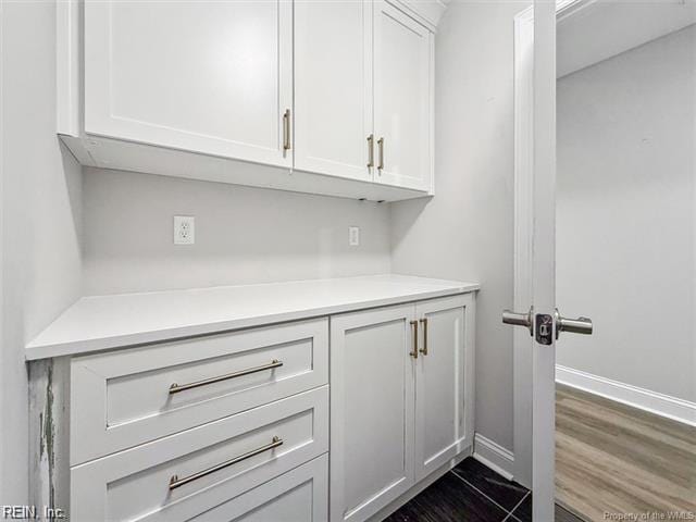 3009 Ridge Dr, Toano, VA 23168 - bar featuring baseboards and dark wood finished floors