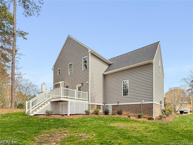 3009 Ridge Dr, Toano, VA 23168 - rear view of house featuring a yard, a deck, and stairway