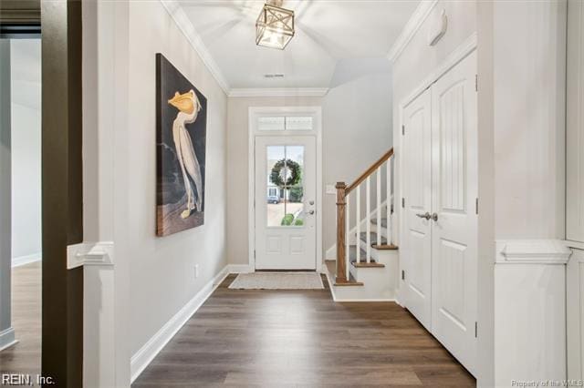 3009 Ridge Dr, Toano, VA 23168 - foyer with baseboards, ornamental molding, dark wood-style floors, and stairway