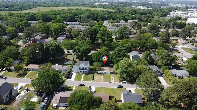 birds eye view of property with a residential view