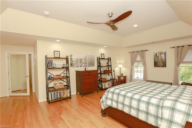 bedroom with recessed lighting and light wood-style flooring