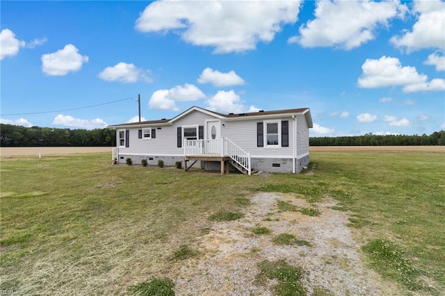 manufactured / mobile home featuring crawl space and a front yard
