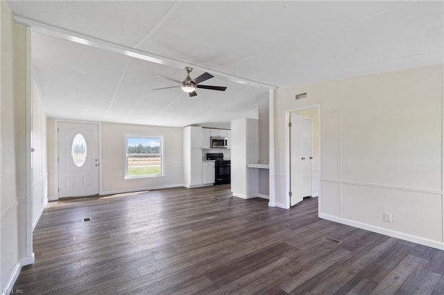 unfurnished living room with visible vents, baseboards, a ceiling fan, dark wood finished floors, and vaulted ceiling