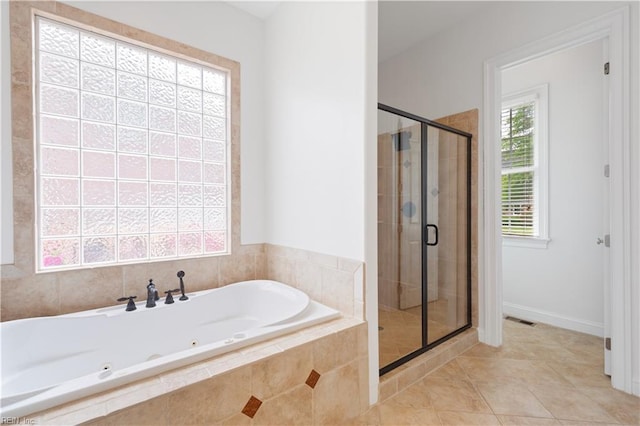 full bath with visible vents, a jetted tub, tile patterned flooring, and a stall shower