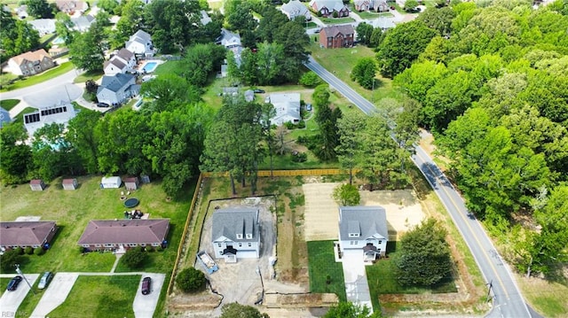 aerial overview of property's location featuring nearby suburban area