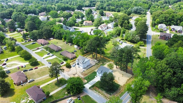 aerial overview of property's location with nearby suburban area