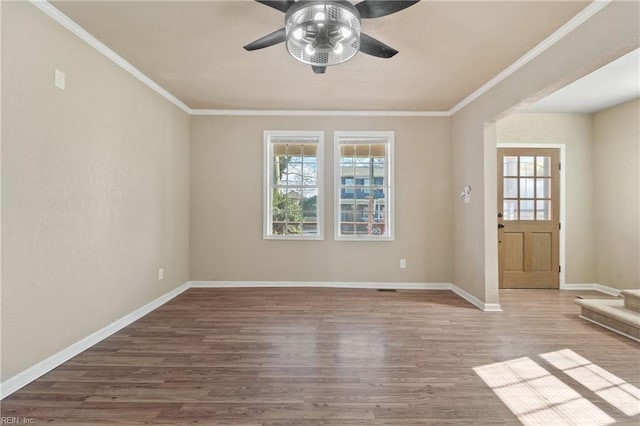2509 Tidewater Dr, Norfolk, VA 23504 - entrance foyer featuring wood finished floors, ceiling fan, baseboards, and ornamental molding