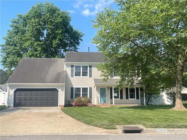 1304 Fernham Ln, Chesapeake, VA 23322 - colonial-style house featuring an attached garage, a front lawn, and concrete driveway