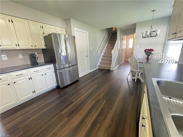 1304 Fernham Ln, Chesapeake, VA 23322 - kitchen featuring stainless steel fridge, dark wood finished floors, a sink, and a healthy amount of sunlight