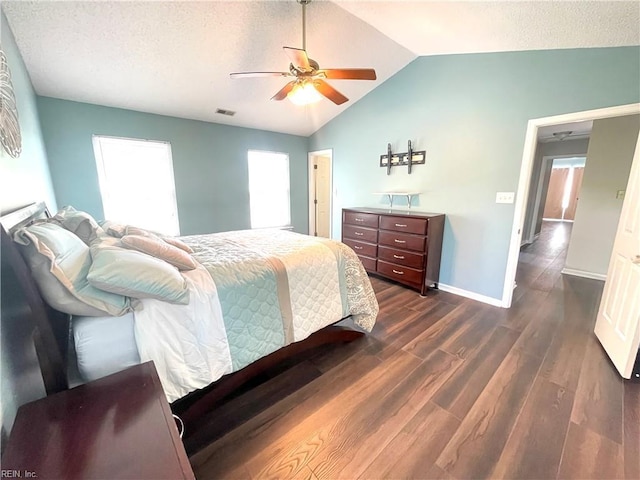 1304 Fernham Ln, Chesapeake, VA 23322 - bedroom featuring visible vents, a ceiling fan, baseboards, vaulted ceiling, and dark wood-style floors