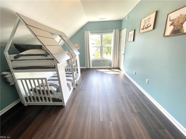 1304 Fernham Ln, Chesapeake, VA 23322 - interior space featuring baseboards, dark wood-style flooring, and lofted ceiling