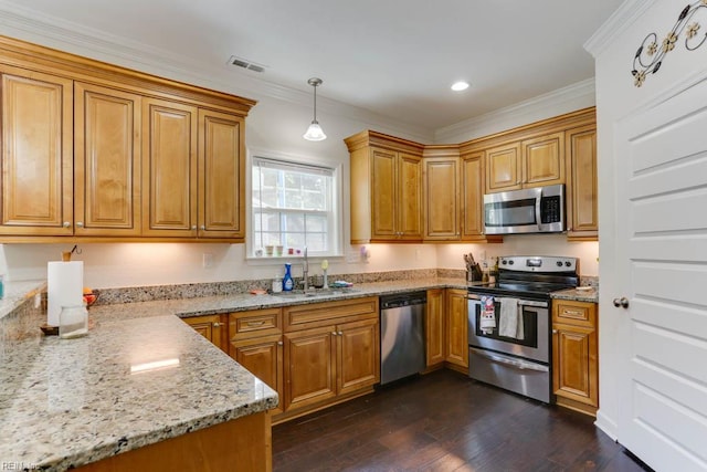 3214 Herbert St, Norfolk, VA 23513 - kitchen with visible vents, appliances with stainless steel finishes, light stone countertops, brown cabinets, and a sink