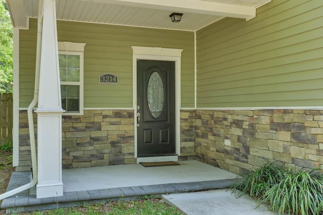 3214 Herbert St, Norfolk, VA 23513 - property entrance with covered porch and stone siding
