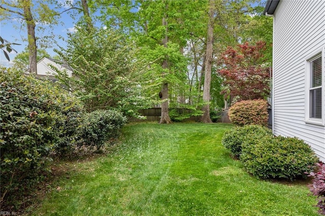 view of yard featuring fence