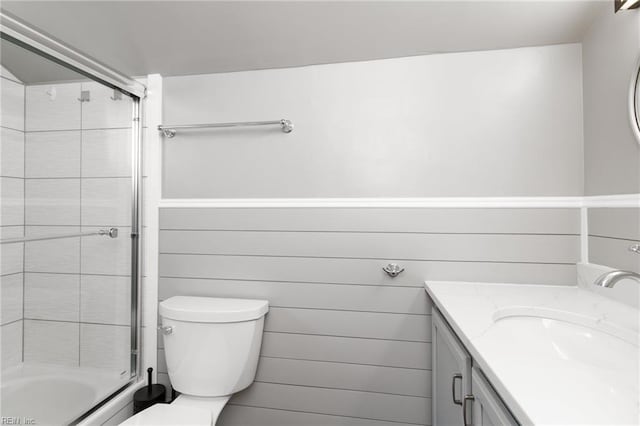bathroom with vanity, bathing tub / shower combination, and toilet