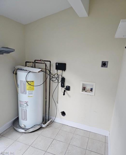 laundry area featuring laundry area, hookup for a washing machine, water heater, electric dryer hookup, and light tile patterned floors