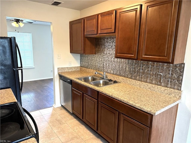 3703 Sylvan Ln, Virginia Beach, VA 23453 - kitchen with black appliances, a sink, tasteful backsplash, light countertops, and ceiling fan