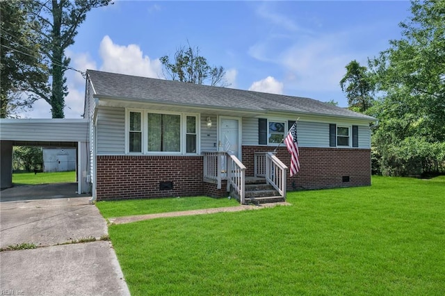 view of front of house featuring a front lawn, brick siding, crawl space, concrete driveway, and a carport