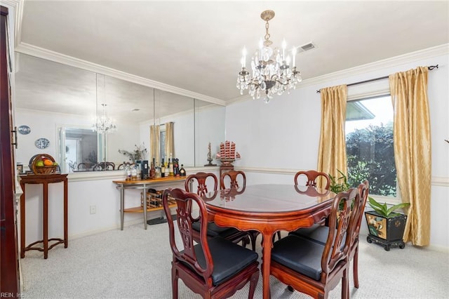 dining room with baseboards, carpet flooring, a chandelier, and ornamental molding