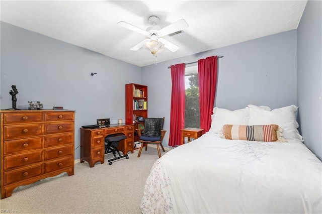 bedroom with a ceiling fan, baseboards, visible vents, and carpet