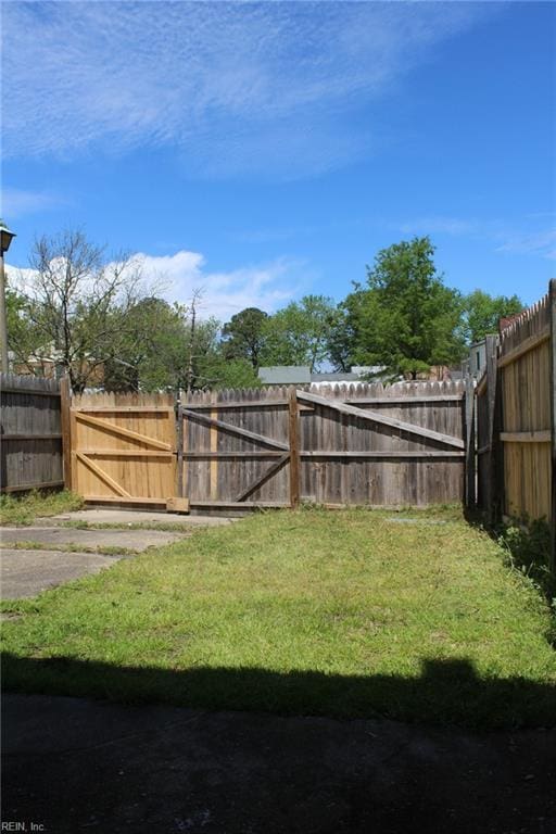view of yard with fence