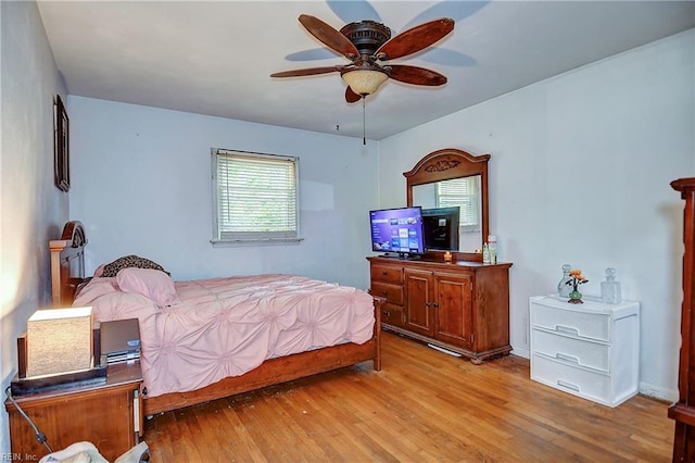 bedroom with light wood-type flooring