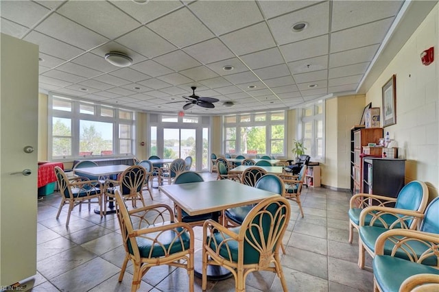 dining room featuring a paneled ceiling and ceiling fan