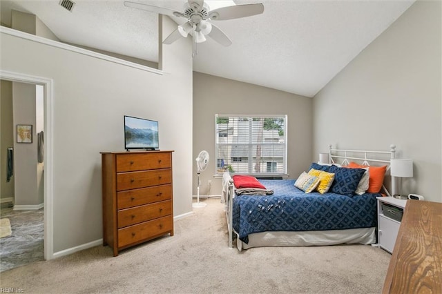 bedroom featuring visible vents, carpet, ceiling fan, and vaulted ceiling