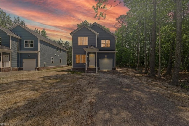 view of front facade featuring an attached garage and driveway