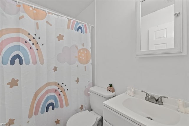 1311 24th St, Newport News, VA 23607 - bathroom featuring vanity, toilet, and curtained shower