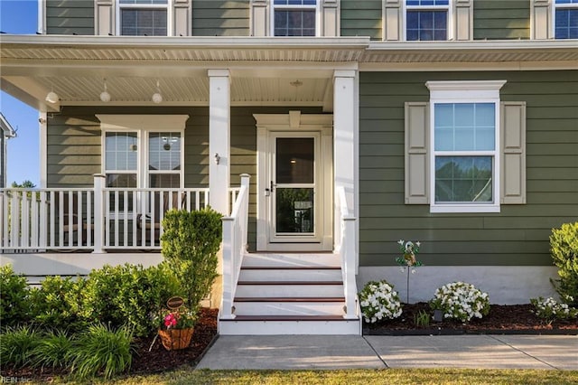 entrance to property with a porch